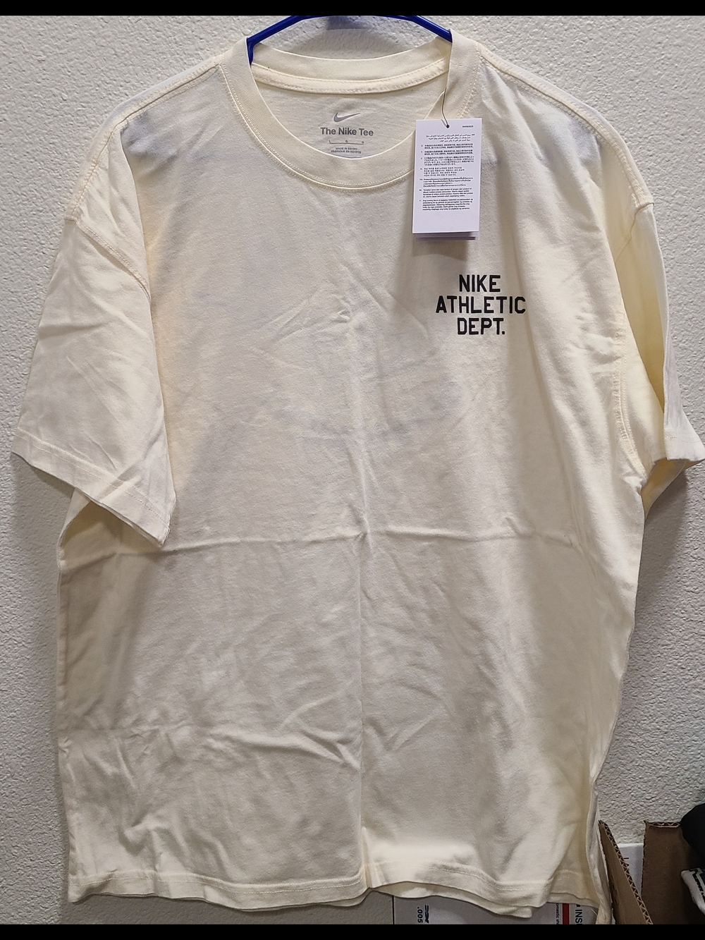 Nike Men's Cream Short Sleeve Tee with Black Chest Print